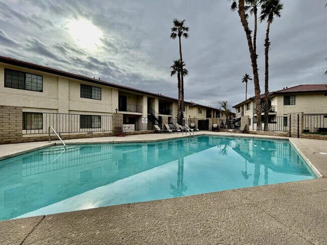 Building Photo - New Flooring, no carpet. 2bed 2bath Gated Community with a Swimming Pool