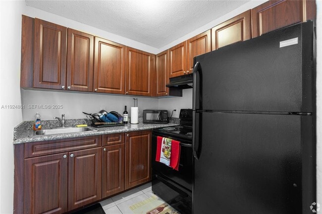 Building Photo - 5755 NW 7th Ave