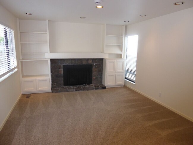 Building Photo - SPACIOUS FOUR BEDROOM / THREE AND HALF BAT...