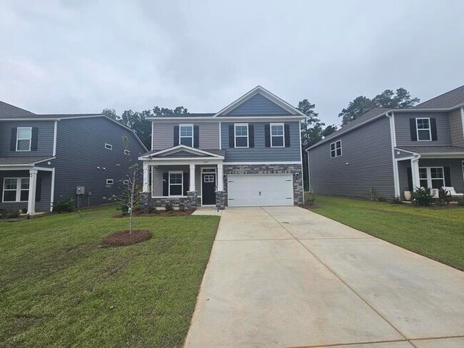 Building Photo - 1 year old 5 bedroom home w community pool!