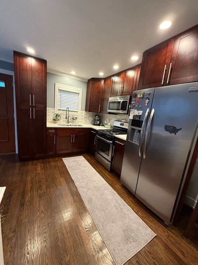 Building Photo - 6415 S Lorel Ave