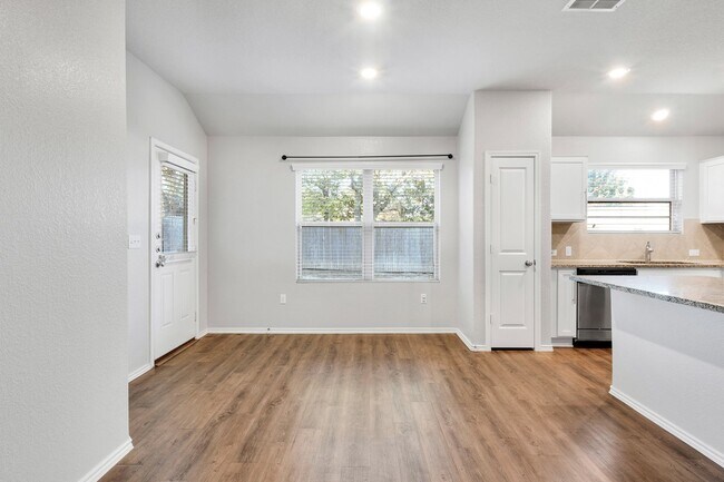 Building Photo - $300 off One Month's Rent! Charming Home with Elegant Granite Countertops and Cabinets