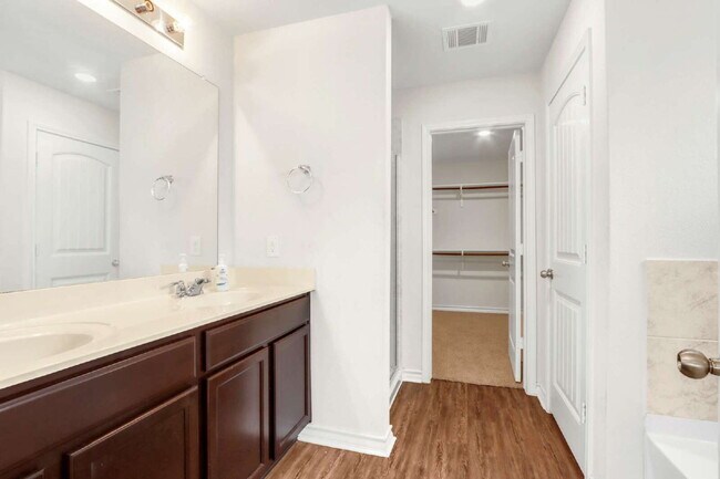 Building Photo - ONE MONTH FREE! Spacious 5-Bedroom Sanctuary with 2.5 Baths and Washer/Dryer Included!