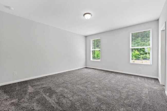 Building Photo - BRAND NEW Townhome located in Westside Ben...