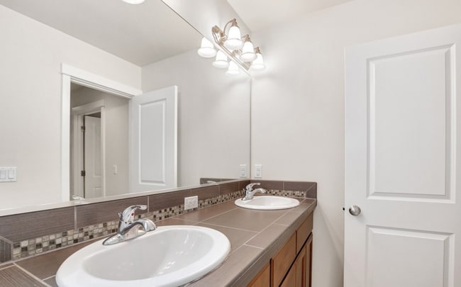 Building Photo - A spacious 4-bedroom and 3.5 bathroom home...