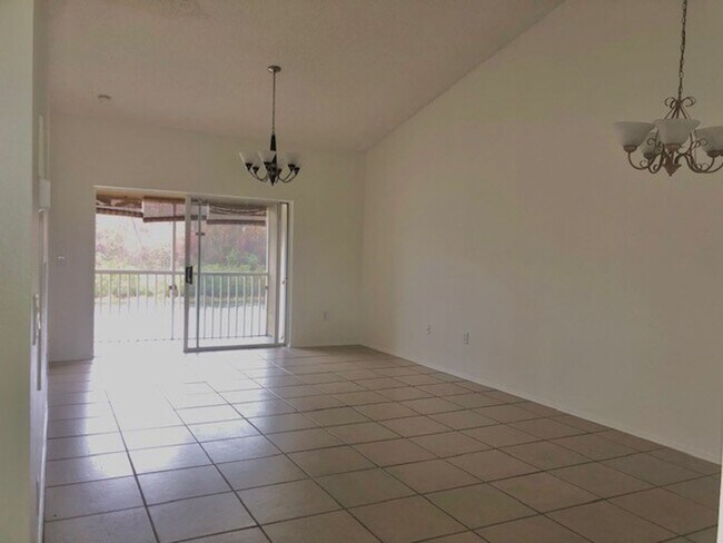 Building Photo - Nice 2X2 located on 2nd floor- Tile & laminate flooring! NO CARPET! Call today!! Tranquil water v...