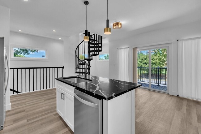 Building Photo - Modern New Construction Townhome with Roof...