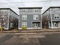Building Photo - Incredible SE Hazelwood 2 Bedroom + 1 Bathroom Condo w/ included Garage and Washer & Dryer!!