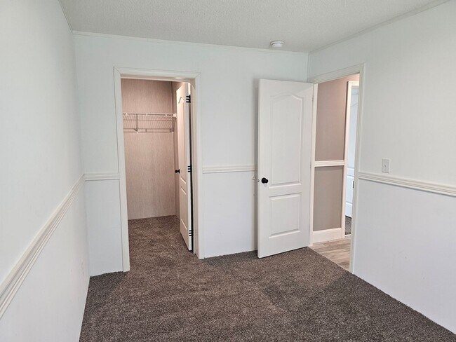 Building Photo - Welcome Home! Spacious 3-Bed, 2-Bath Split Floor Plan on ¾ Acre Lot