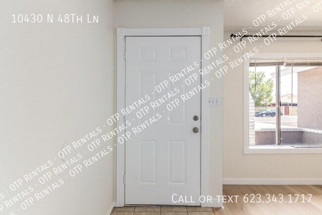 Building Photo - 10430 N 48th Ln