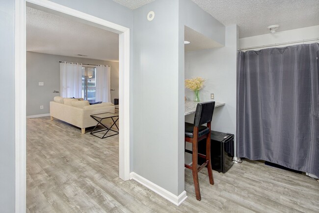 Building Photo - Welcome to this updated, fully furnished g...