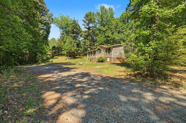 Building Photo - Updated 3-Bedroom Home on 10 acres in Chapel Hill