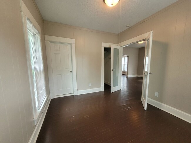 Building Photo - Two bedroom home with partially fenced yard!