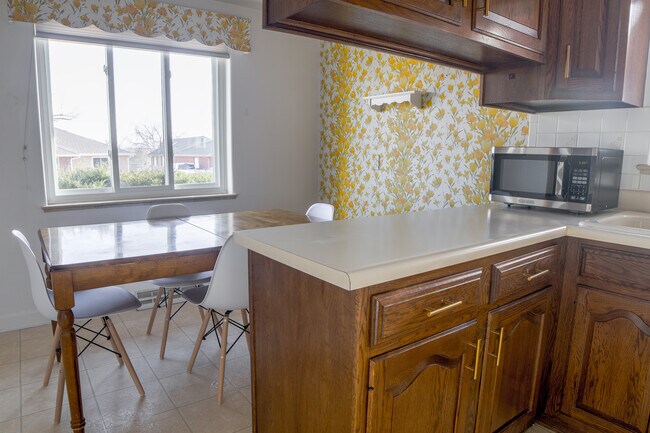 Building Photo - 6185 W 61st Ave