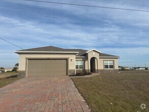 Building Photo - 3 Bedroom - 2 Bathrooms - 2 Car Garage - N...