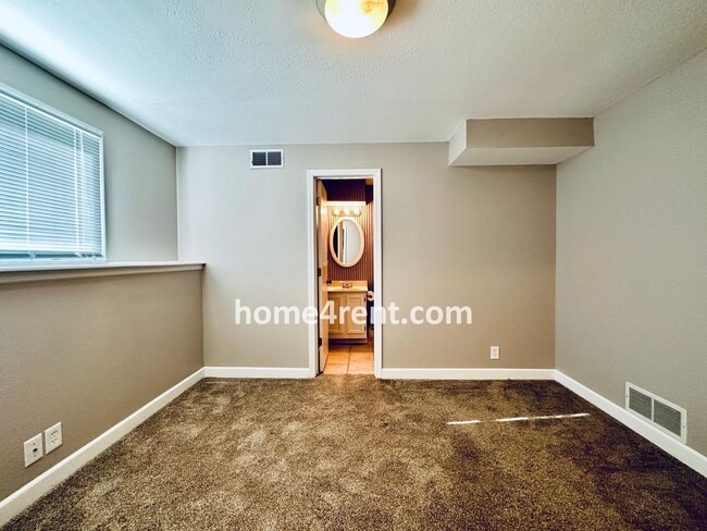 Building Photo - Updated Kitchen, Composite Deck and Refrig...