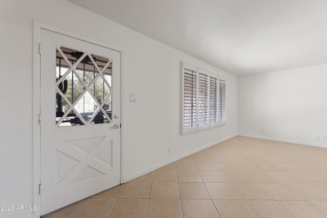 Building Photo - 8520 E Roma Ave