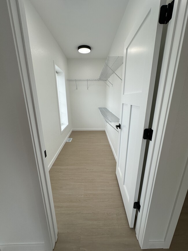 Walk In Closet - 211 S Main St