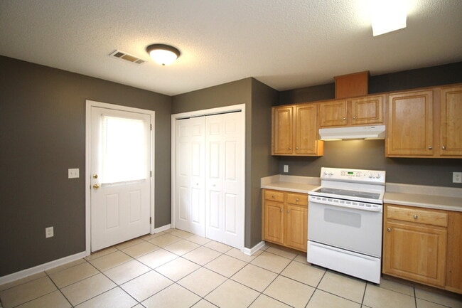 Building Photo - Don’t Miss This Milton Duplex — 2BR/2BA Brick Home with Garage, Walk-In Closet, Open Living Space...