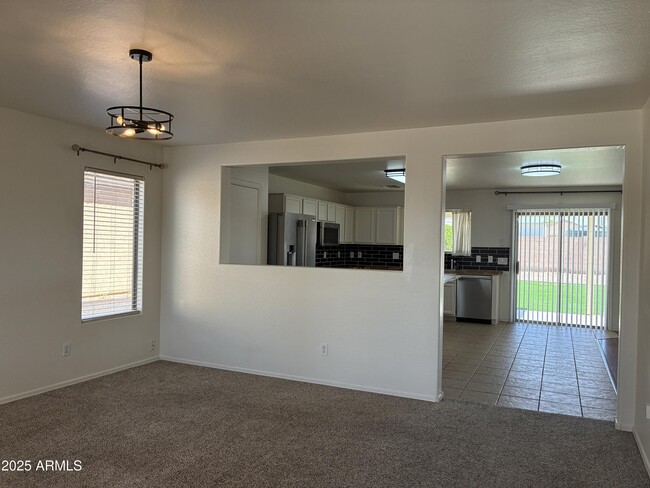 Building Photo - 7287 S Sunrise Way