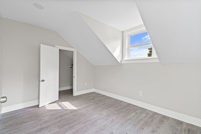 Building Photo - Spacious 3-Bedroom Home with Sunroom & Off-Street Parking in Johnston!