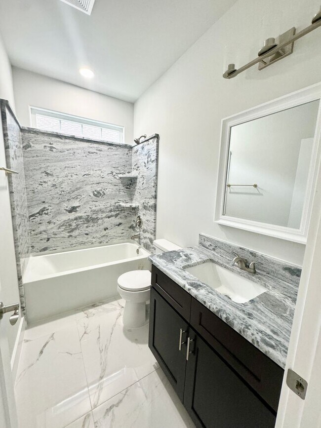 Building Photo - LOOK AT THIS ONE! BEAUTIFUL home with a pond view right outside the back patio!