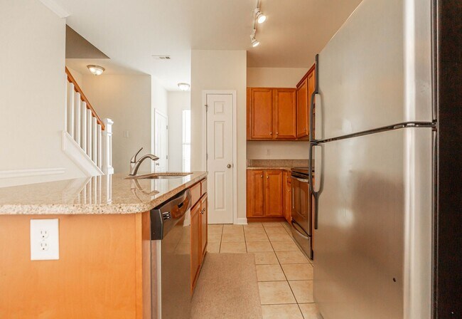 Building Photo - Located just Steps from Shopping, Dining, ...