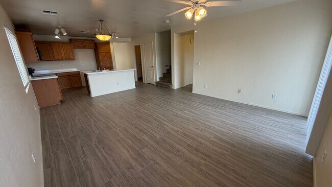 Building Photo - Two Story Home with NEW tile and a large backyard!