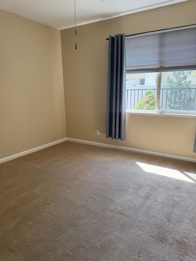 Building Photo - Located in a Quiet, Gated Community in Car...