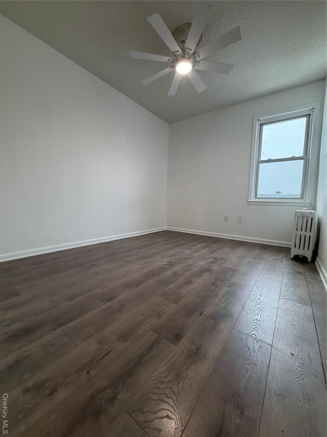 Building Photo - 122-15 11th Ave