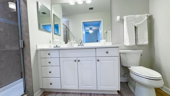 Building Photo - Elevated Luxury at The Terraces – 4th Floor Lake & Golf Course Views! 55+ Community!