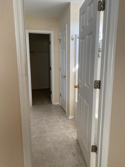 bathroom and walk in closet for master suite - 765 Dragonfly Dr