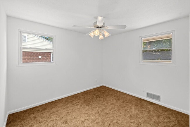 Building Photo - Rare Garage, Fully Fenced, and Steps to Me...