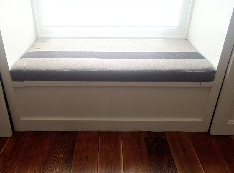 Classic Hudsons Bay wool blanket finds new life as a luxurious window seat bench (with hidden storage beneath) - 2635 NE 30th Ave