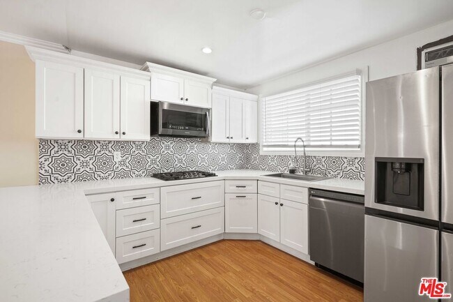 Building Photo - 6558 Neddy Ave