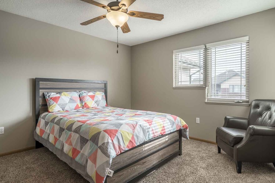 Enjoy ceiling fans in many units. - Southwind Villas