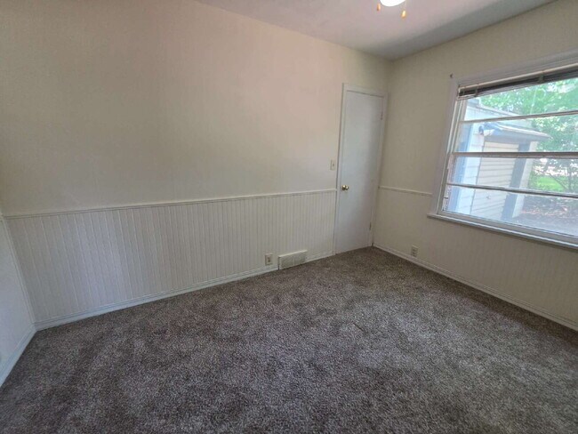 Building Photo - 2 Bedroom, 1 Bathroom West Hill Home with Fenced Yard, Garage, & Bonus Living Space