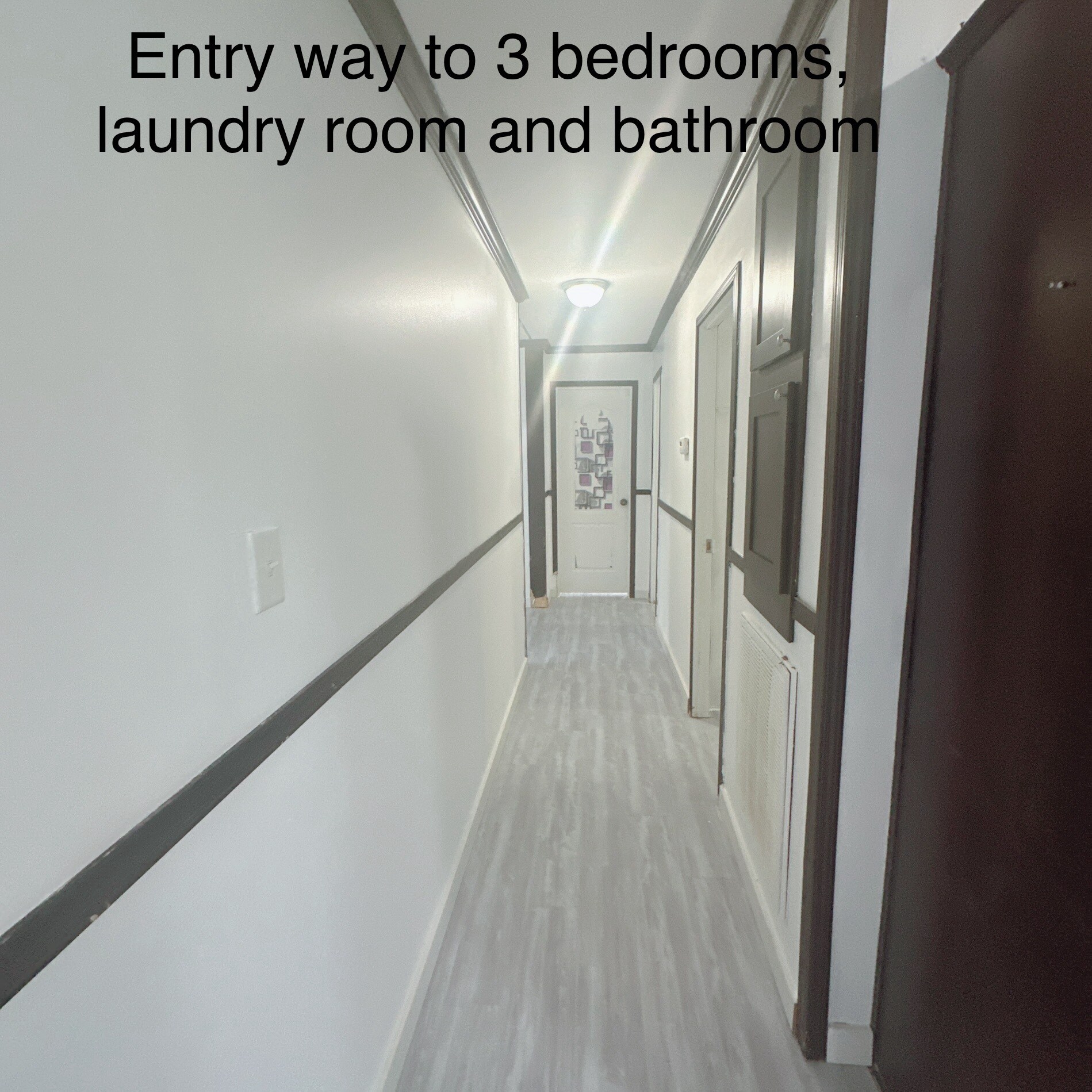 Hallway to the other rooms and laundry room - 2436 Bay Lake Loop