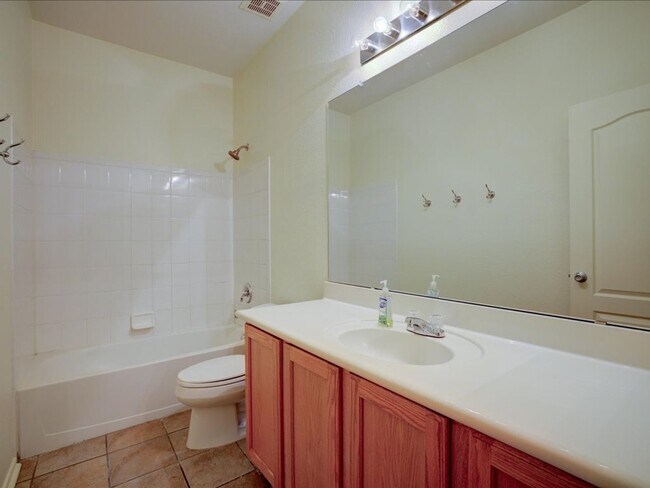 Building Photo - Ready Living: Solar Panels, EV Charging & Open-Concept Design!