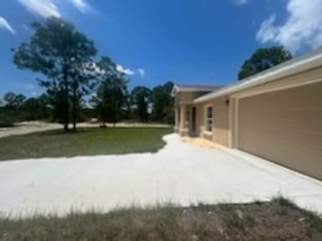 Building Photo - 3/2/1 Single Family Home Available-Cozy Pe...