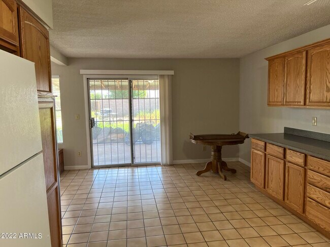 Building Photo - 7827 W College Dr