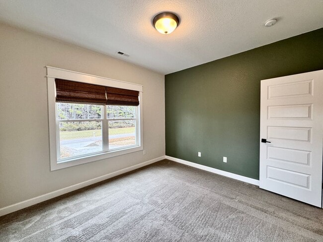 Building Photo - Farmhouse-style Home - Ready NOW in Pungo! A First Time Rental with a HUGE Fenced Yard, Attached ...