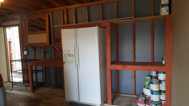 Car Garage * Two car garage. * Custom workshop space in garage with numerous built-ins. * New garag - 23631 Twisting Falls Drive