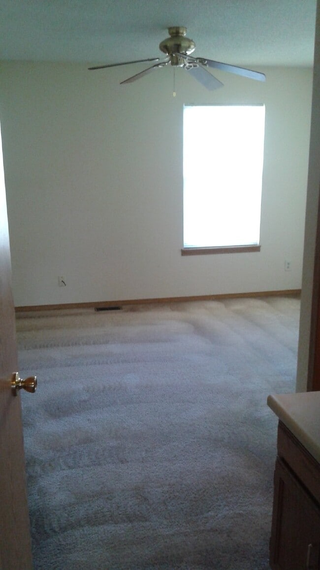 Building Photo - Available Now! "Charming 2-Bed Townhouse with Fireplace Oasis on South Trenton Street!"