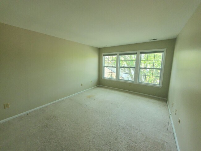 Building Photo - Condominium living at its finest! Updated,...