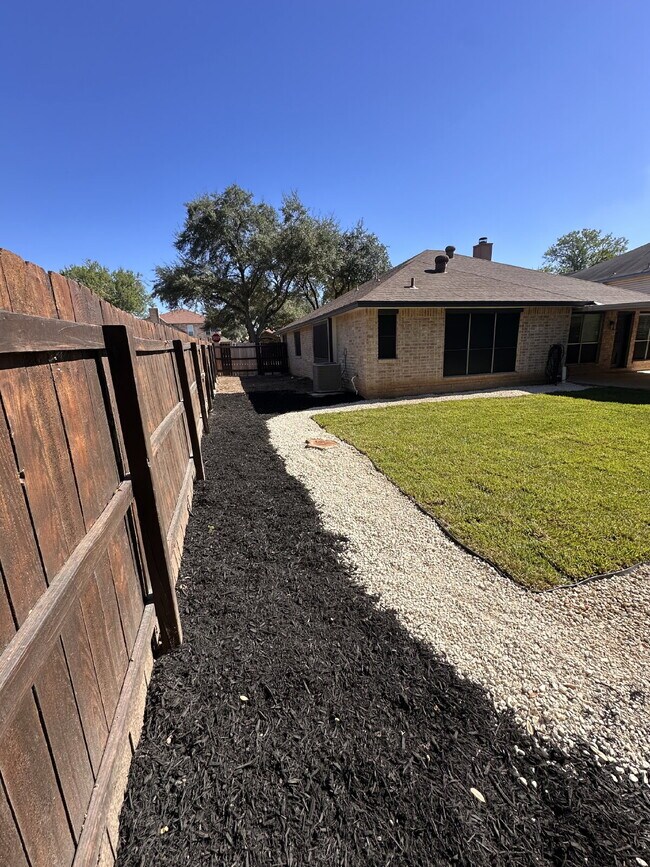 Building Photo - "Charming 4-Bedroom Home with Elegant Gran...