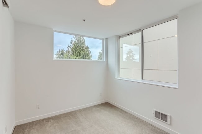 Building Photo - Luxurious 2-Bedroom Townhome with HUGE Multifunctional Space AND loft