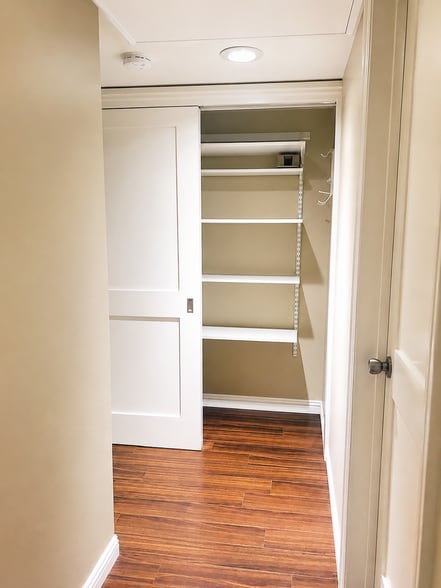 Hallway: Extra hallway storage with built-in shelving. - 6191 Rancho Mission Rd
