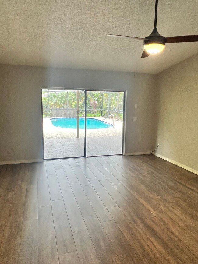 Building Photo - BEAUTIFUL 3 BEDROOM POOL HOME IN SANDPIPER...