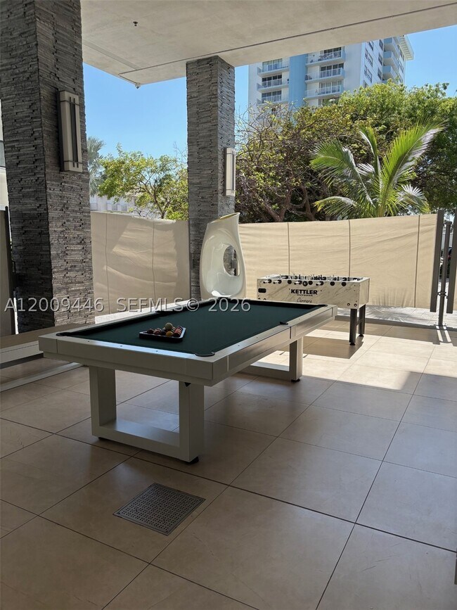 Building Photo - 5875 Collins Ave